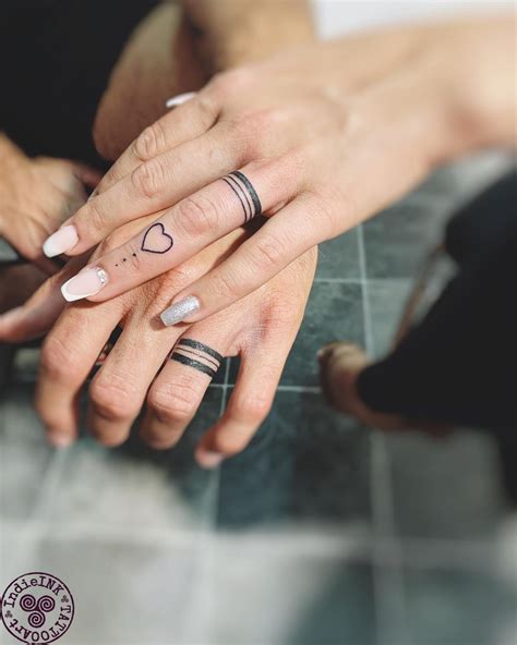 tattoo on ring finger|ring finger tattoos for couples.